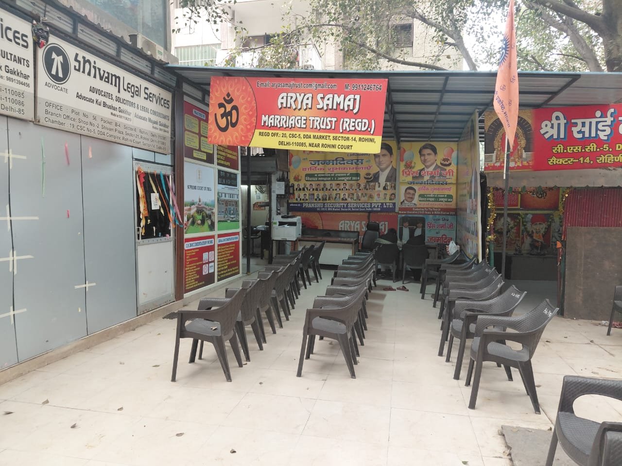Real photo of Arya Samaj Marriage Trust office at Rohini Court Sector-14 Delhi with legal services and Shivam Legal boards